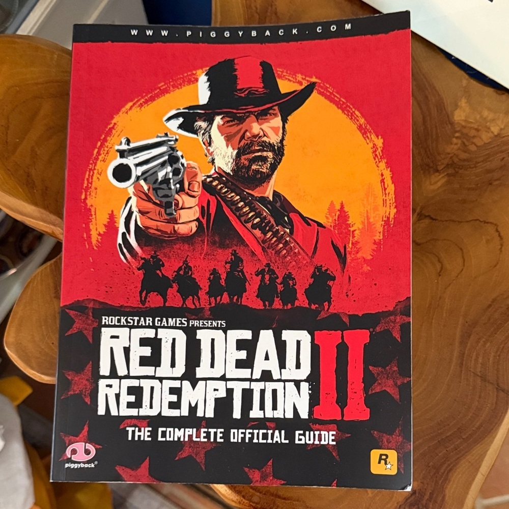 Red Dead Redemption II The Complete Official Paperback Guide by Piggyback